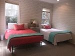 Bedroom with two queen beds and en suite bath